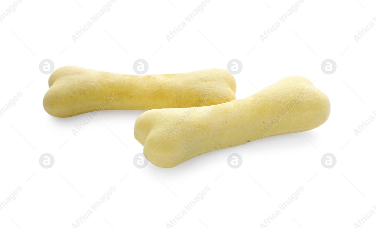 Photo of Bone shaped dog cookies on white background