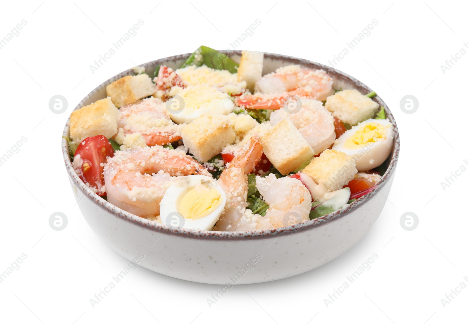 Photo of Delicious Caesar salad with shrimps isolated on white