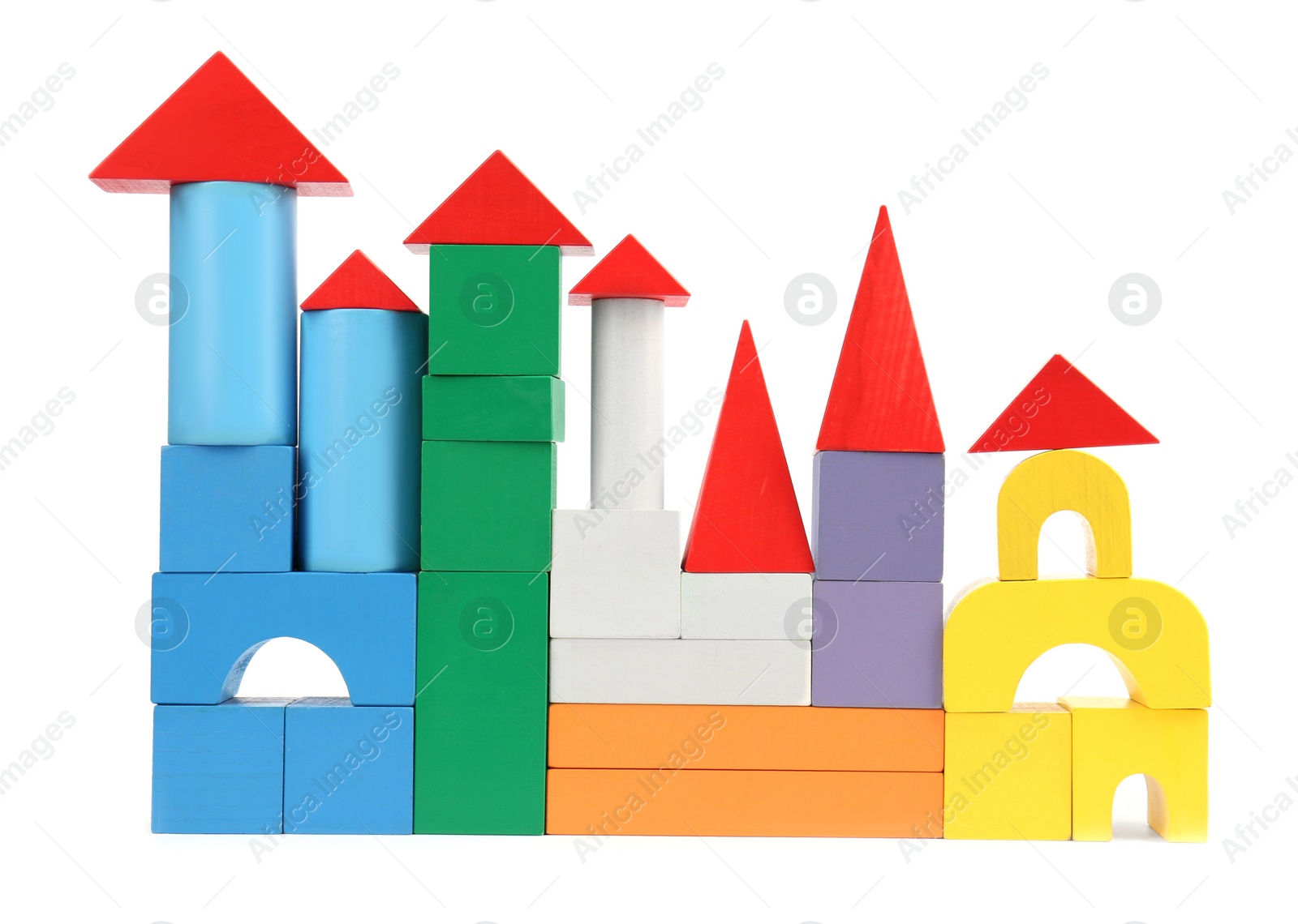 Photo of Building made of colorful blocks isolated on white. Children's toys
