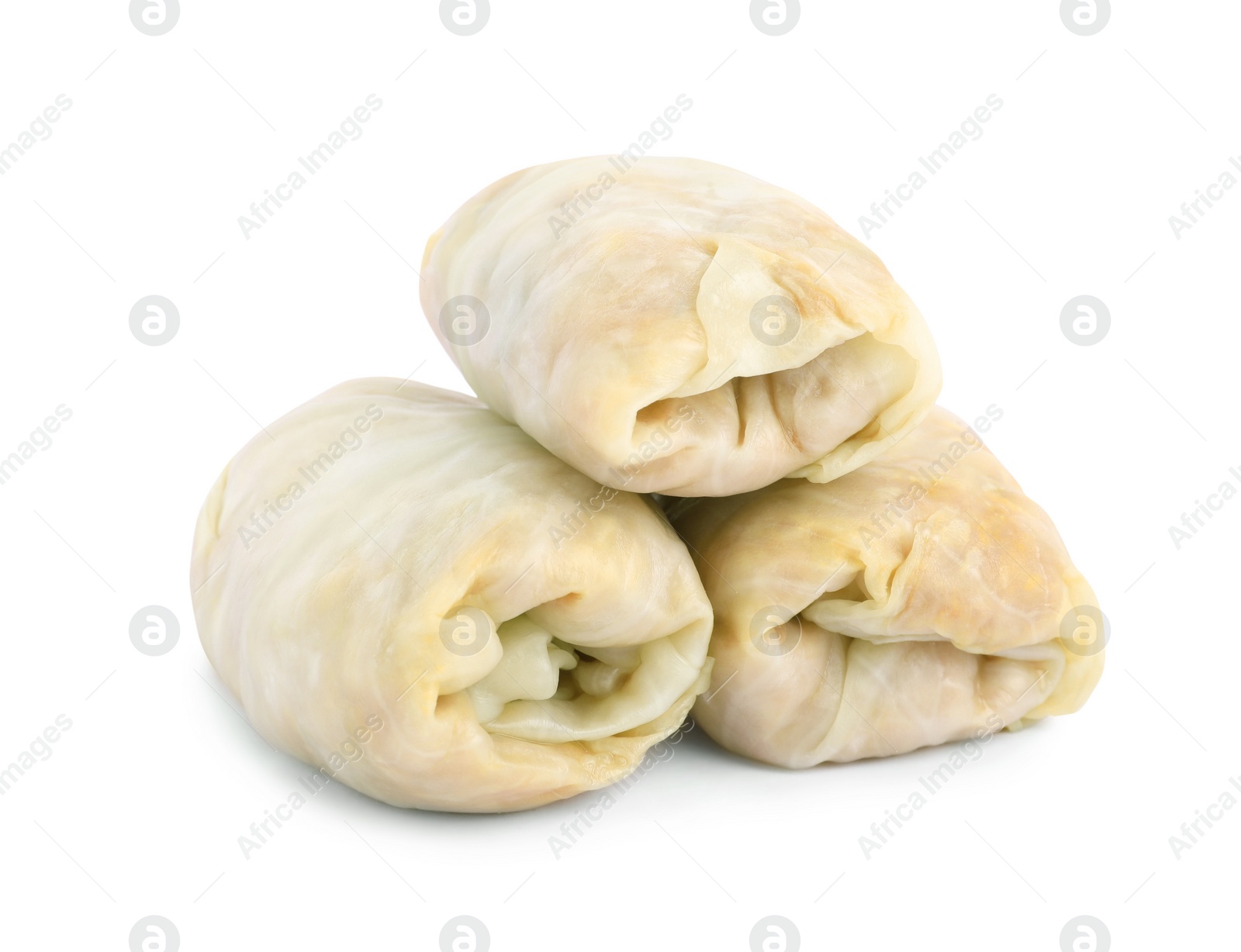 Photo of Uncooked stuffed cabbage rolls on white background