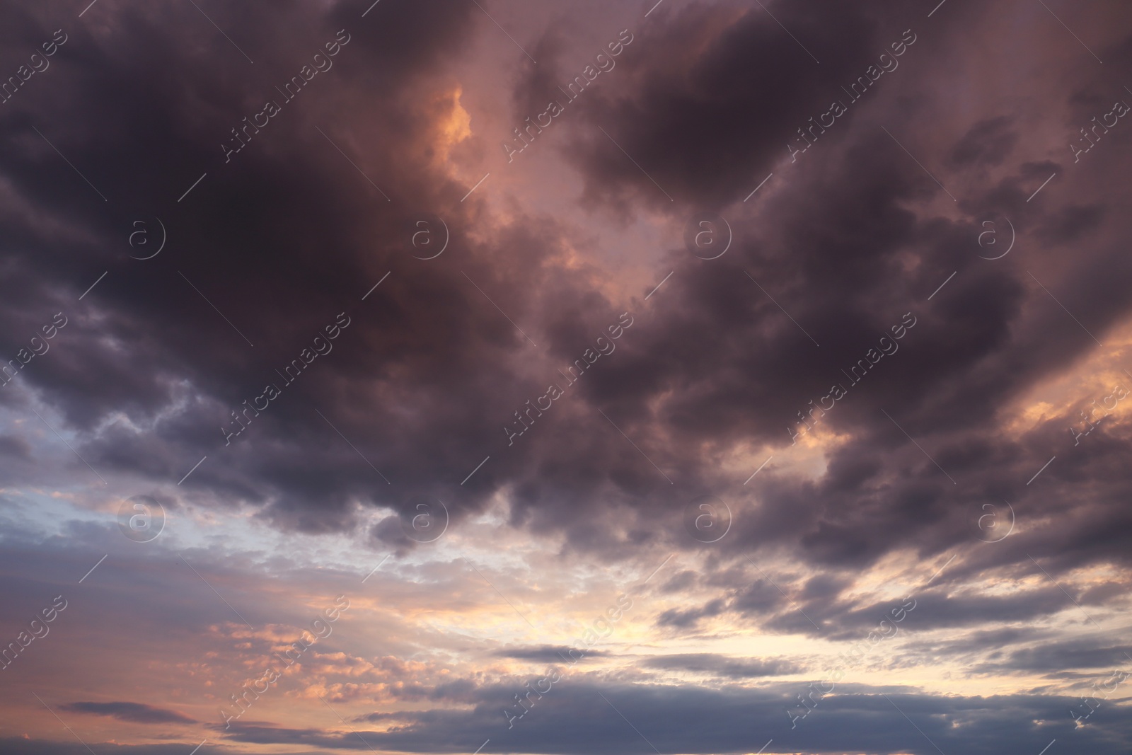 Photo of Picturesque view of sunset sky with beautiful clouds