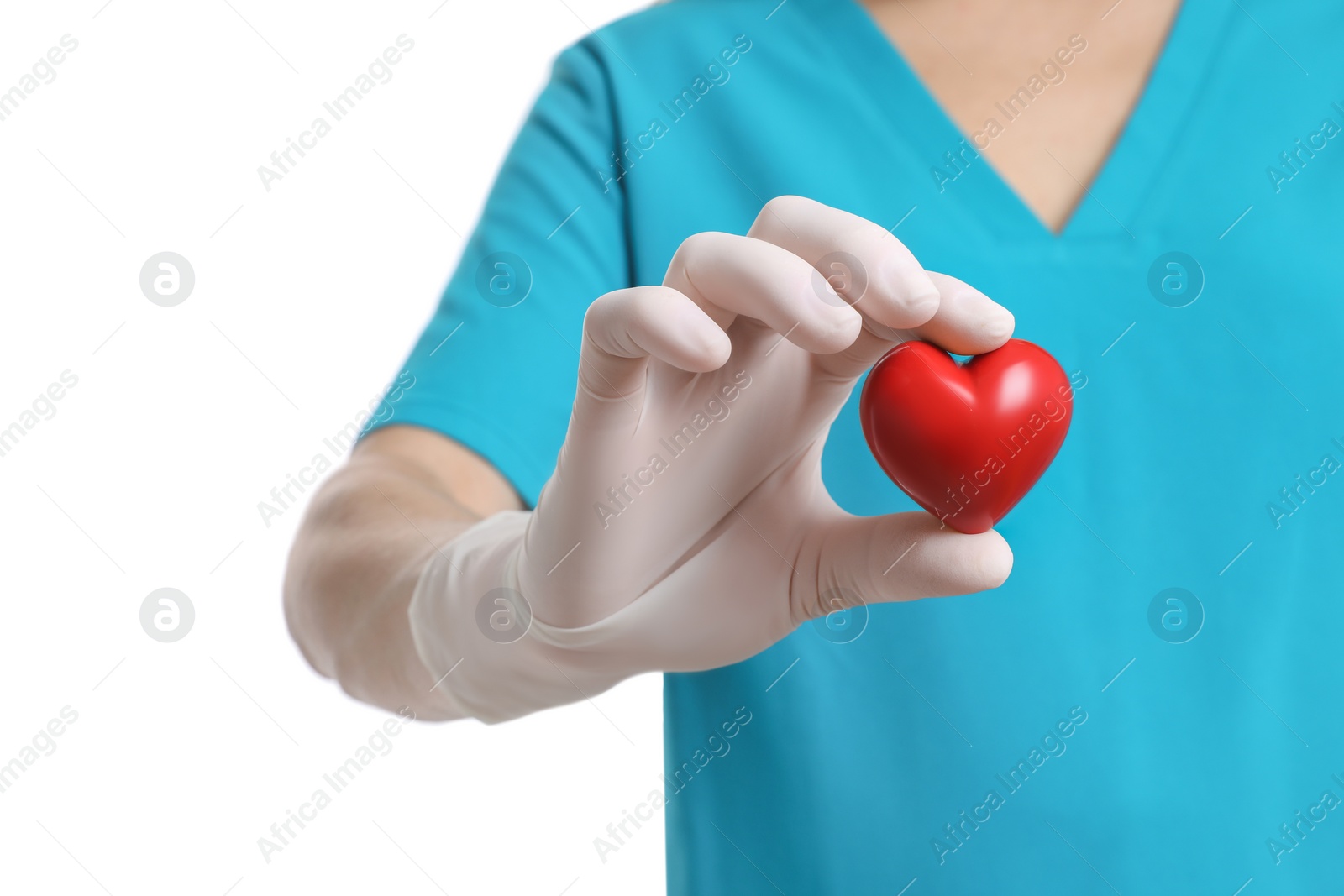 Photo of Doctor in medical glove holding red heart on white background, selective focus