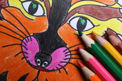 Child's colored drawing with pencils, closeup view