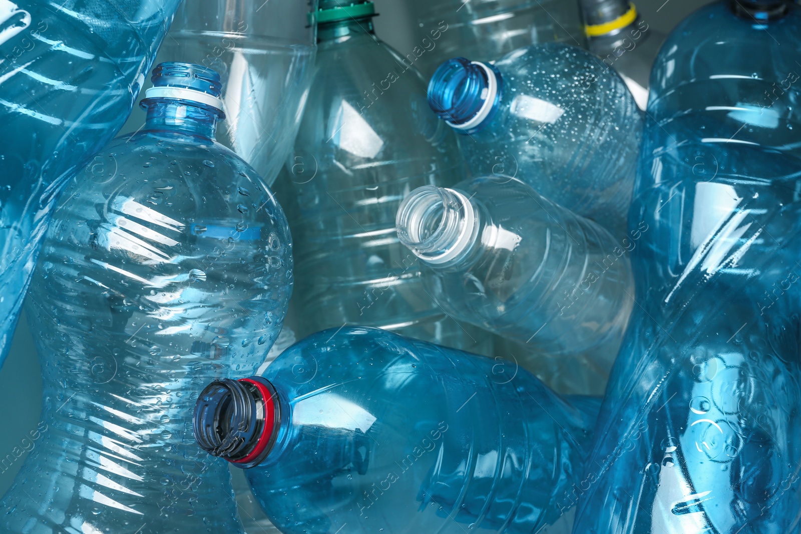 Photo of Many plastic bottles as background, closeup. Recycle concept