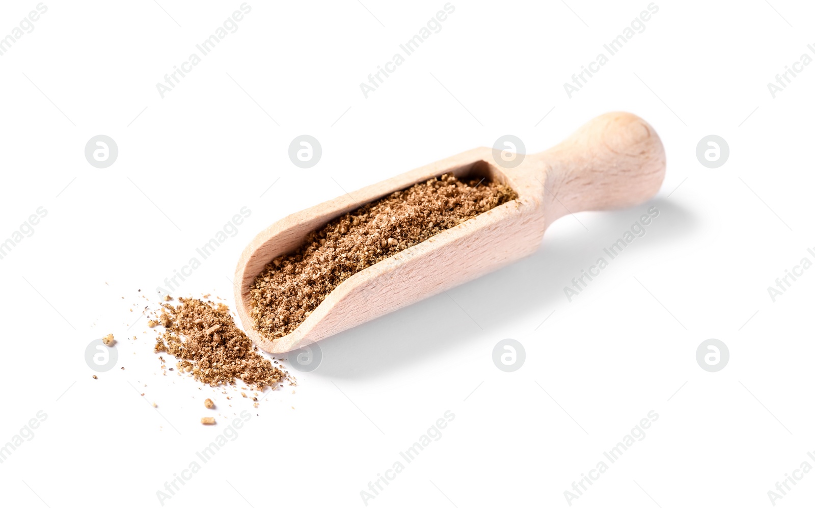 Photo of Scoop of aromatic caraway (Persian cumin) powder isolated on white