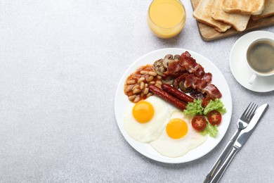 Photo of Delicious breakfast with sunny side up eggs on light table, flat lay. Space for text