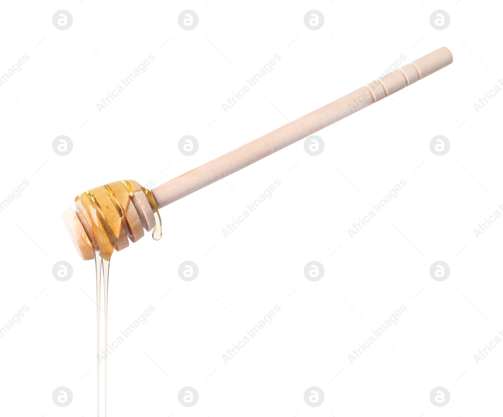 Photo of Fresh honey dripping from dipper on white background