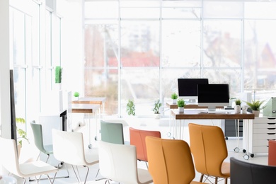 Office interior with many comfortable chairs. Business training