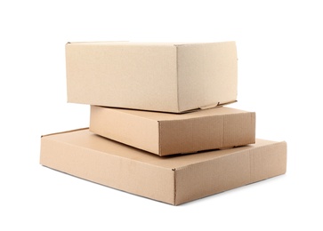 Photo of Stack of cardboard boxes on white background