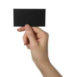 Photo of Woman with blank black business card on white background, closeup. Mockup for design