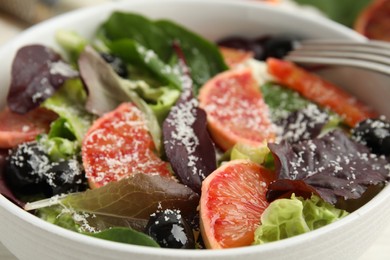 Photo of Bowl of delicious sicilian orange salad, closeup