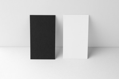 Blank business cards on white background. Mockup for design