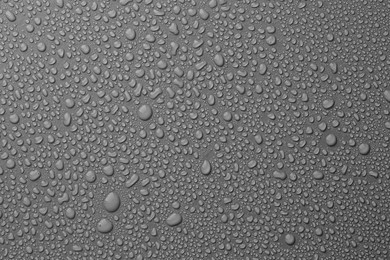 Photo of View of many water drops on grey background