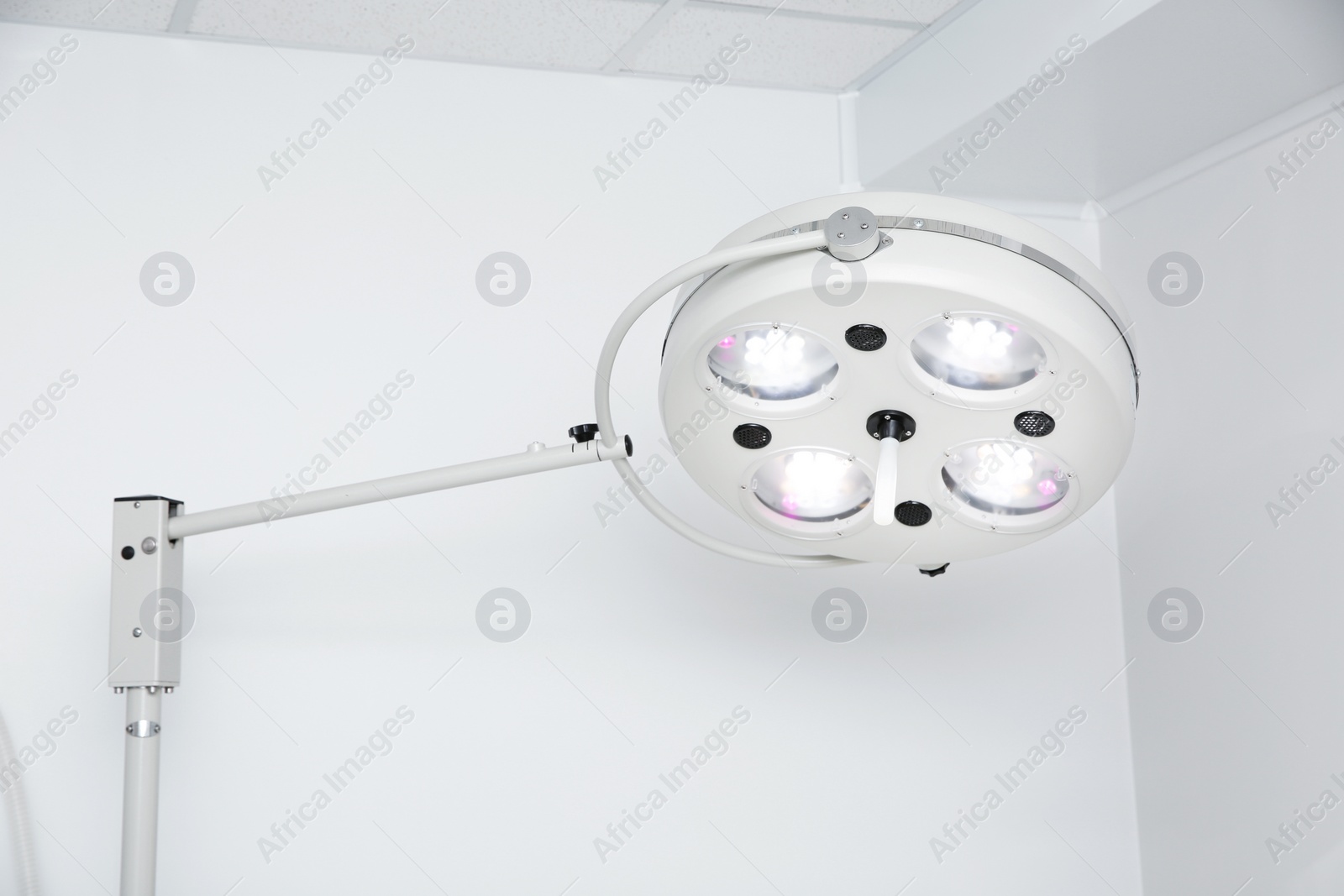 Photo of Powerful surgical lamps in modern operating room