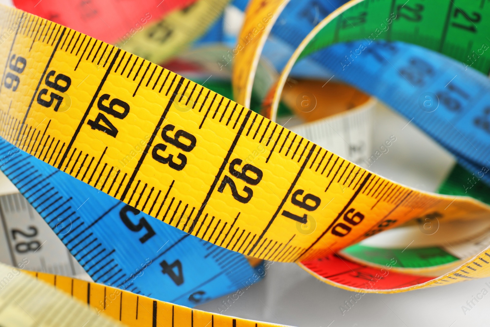 Photo of Different measuring tapes, closeup