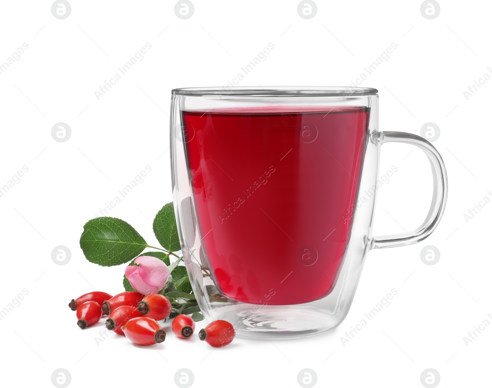 Photo of Aromatic rose hip tea, flower and fresh berries on white background