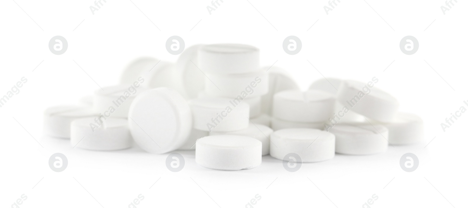 Photo of Pile of pills on white background. Medical treatment