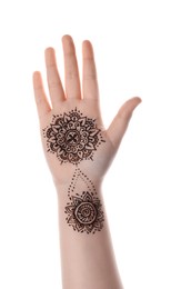 Photo of Little girl with henna tattoo on palm against white background, closeup. Traditional mehndi ornament