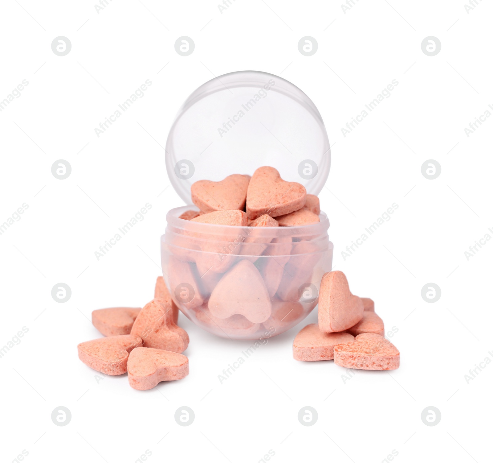 Photo of Heart shaped vitamins with container for pets isolated on white