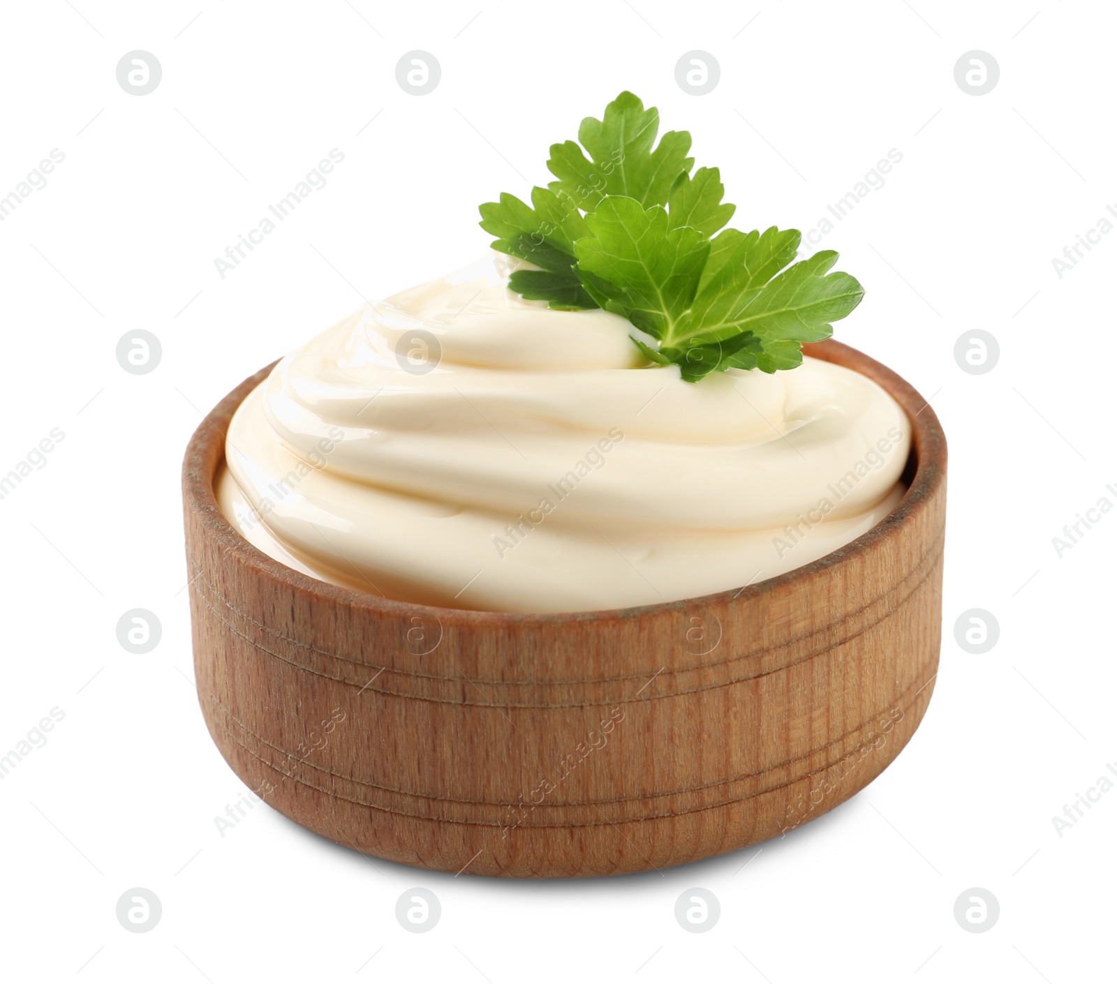 Photo of Bowl with delicious mayonnaise and parsley isolated on white