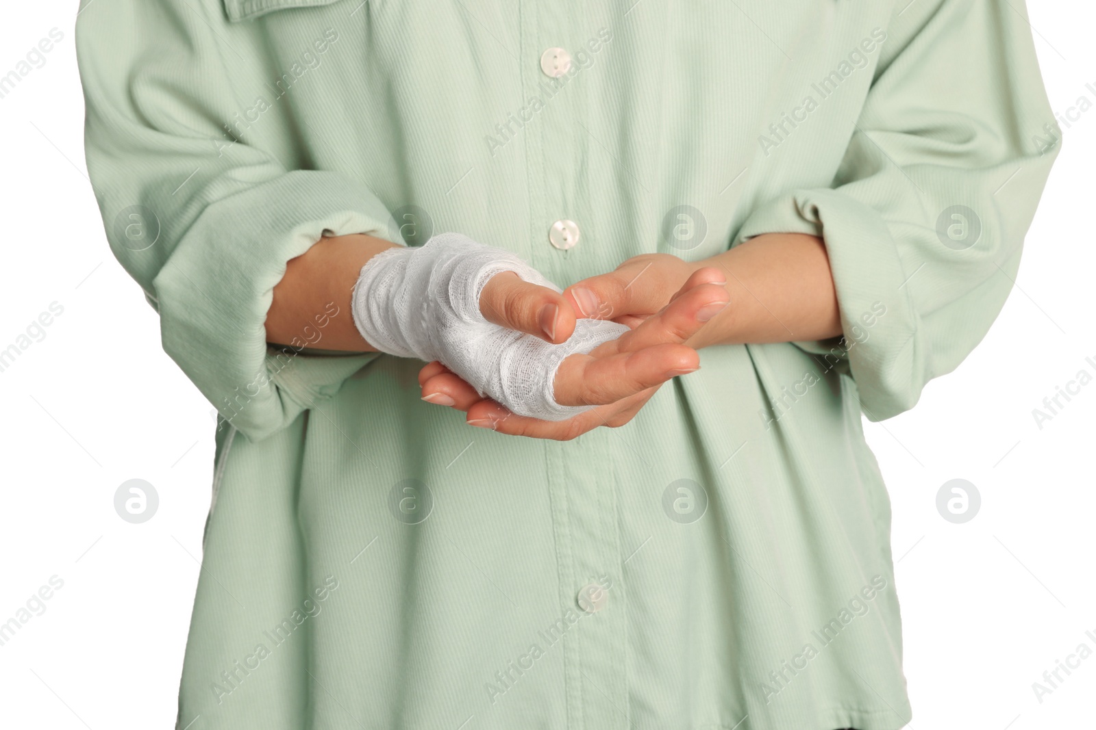 Photo of Woman with hand wrapped in medical bandage on white background, closeup