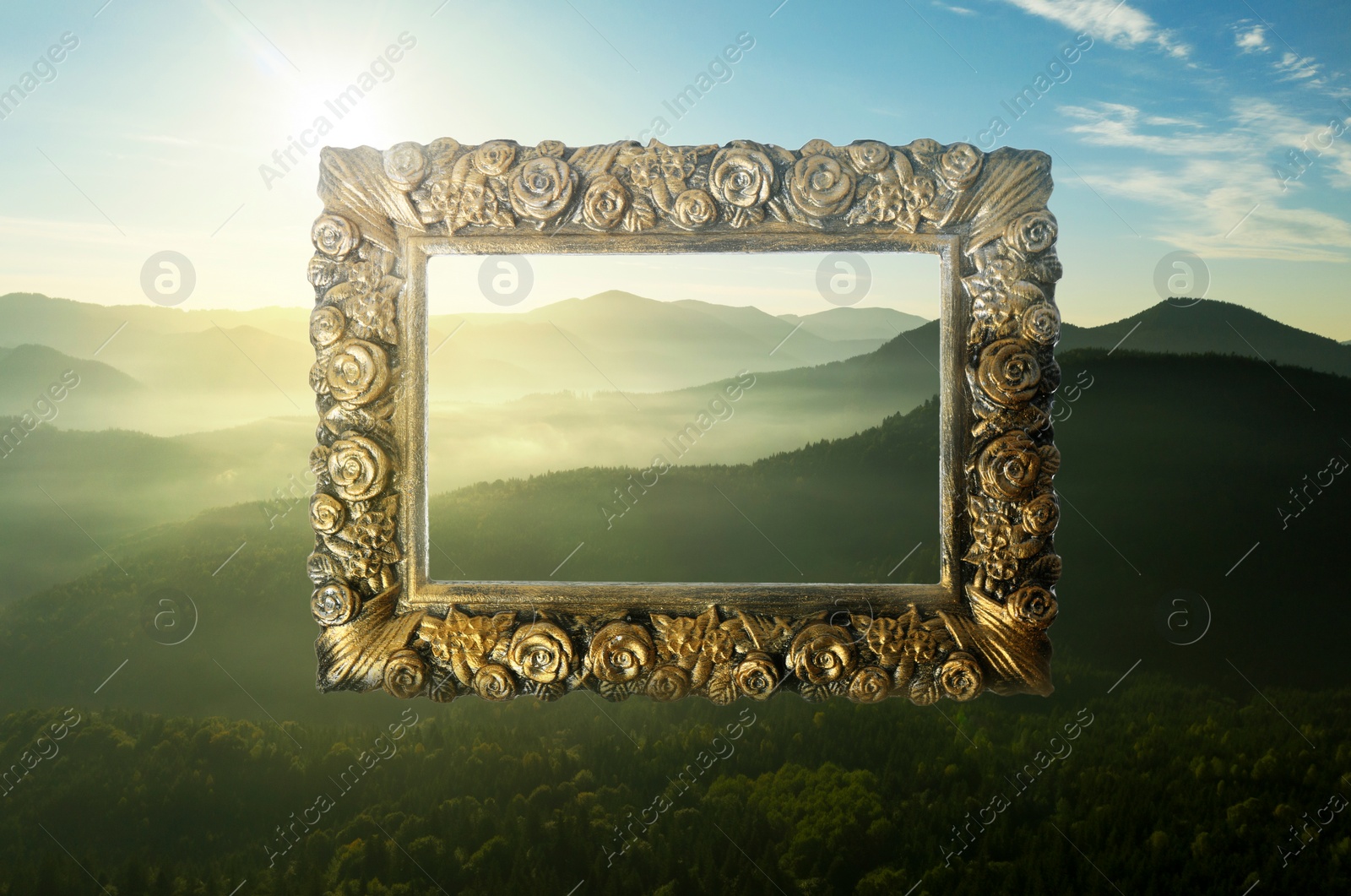 Image of Vintage frame and beautiful mountains with fog in morning