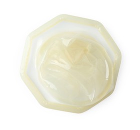 Female condom isolated on white, top view. Safe sex