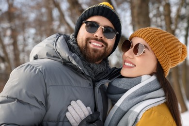 Beautiful happy couple spending time together on winter day