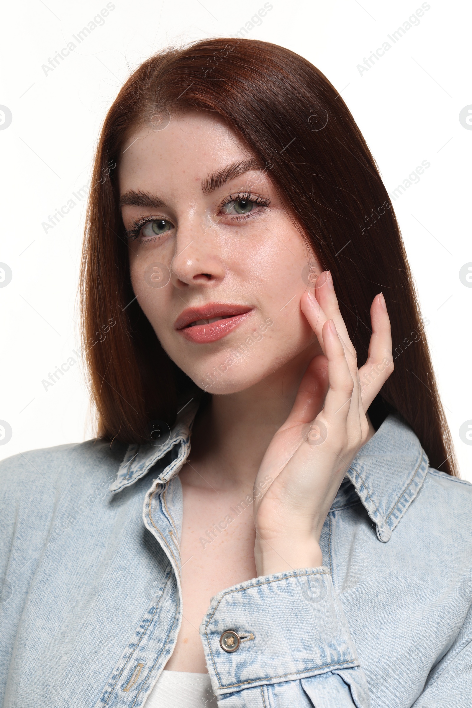 Photo of Portrait of beautiful woman with freckles on white background