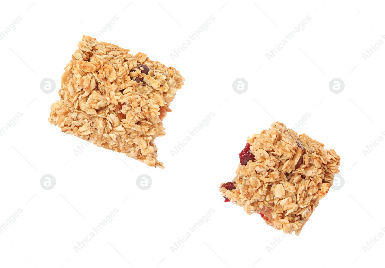 Photo of Pieces of tasty granola bar isolated on white