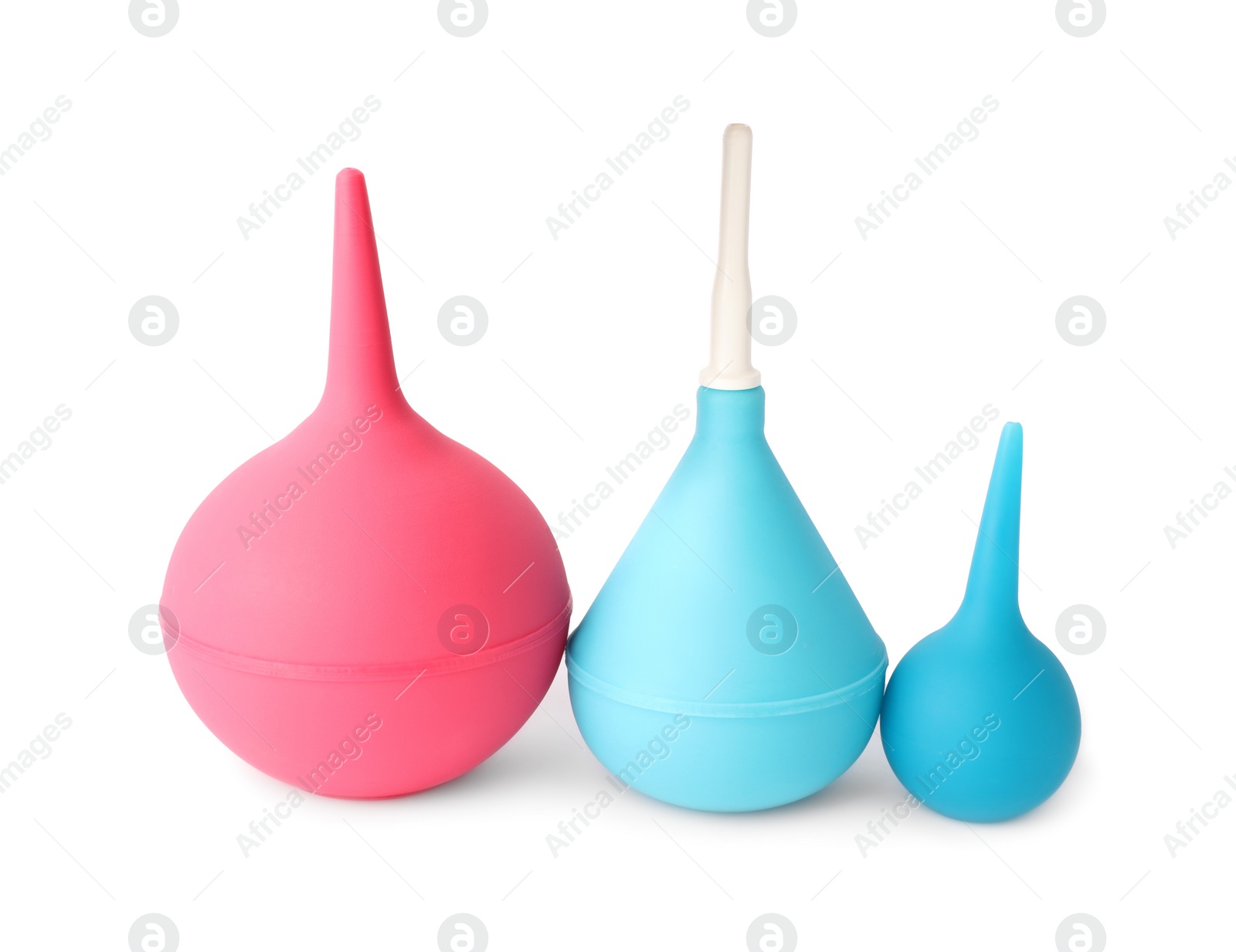 Photo of Different enemas on white background. Medical treatment