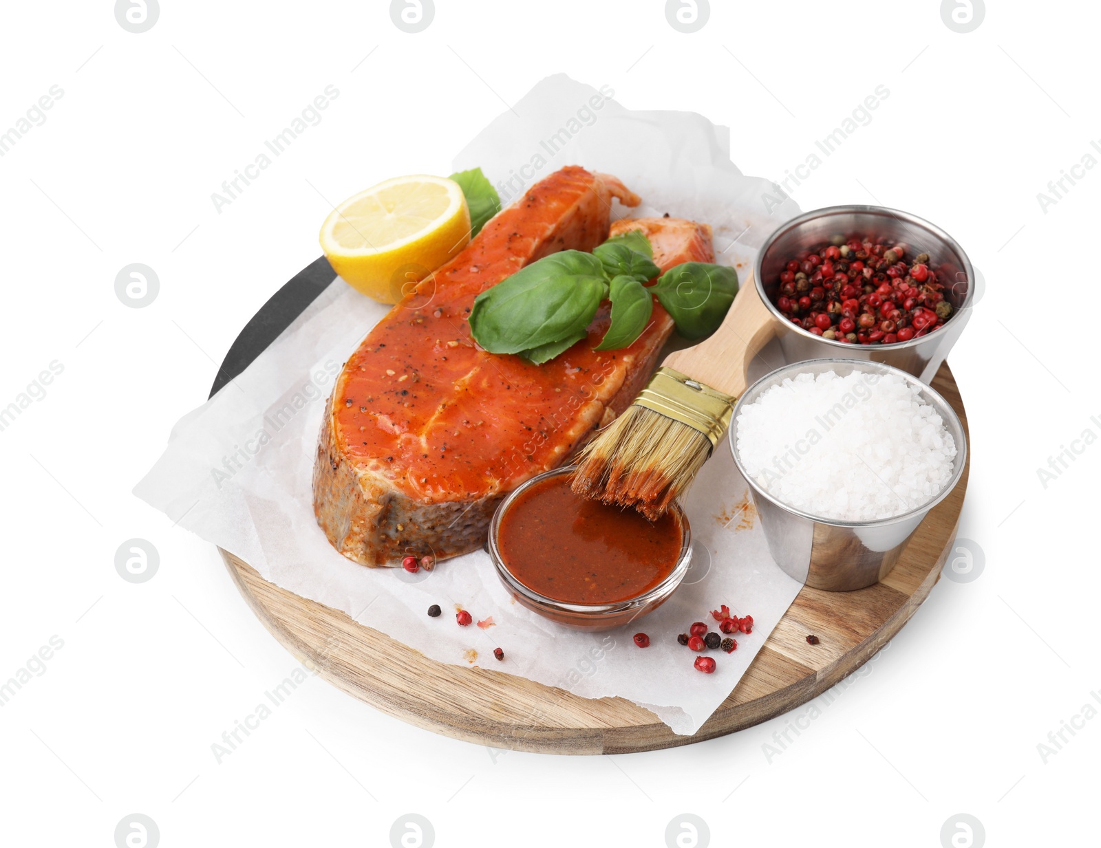 Photo of Fresh marinade, fish and other products isolated on white