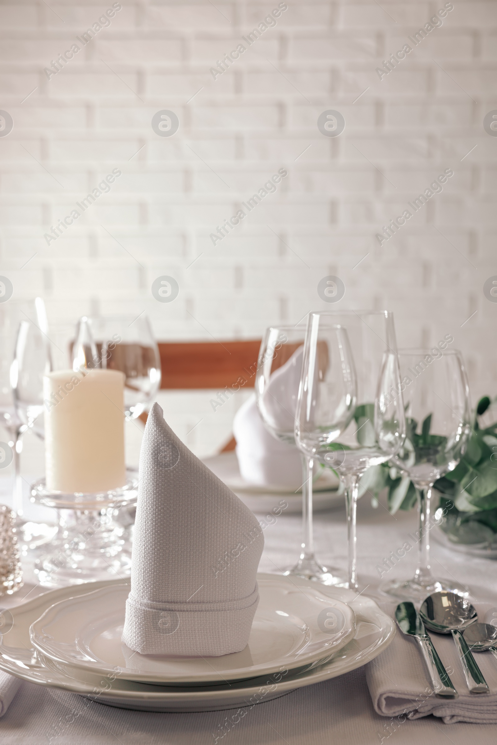 Photo of Stylish elegant table setting in restaurant. Space for text