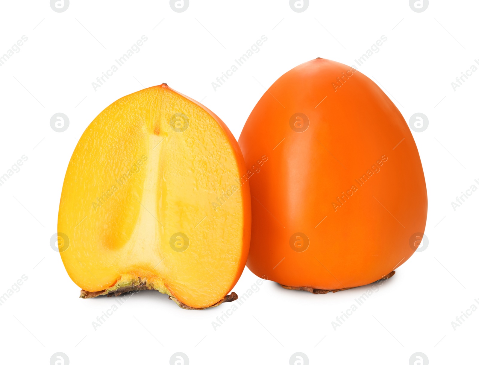 Photo of Whole and cut delicious ripe juicy persimmons on white background