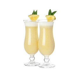 Tasty Pina Colada cocktail on white background