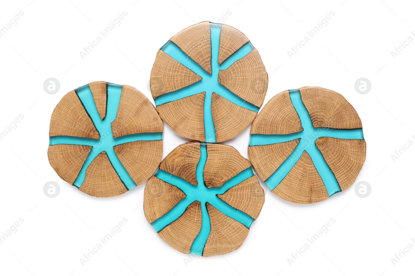 Photo of Stylish wooden cup coasters on white background, top view