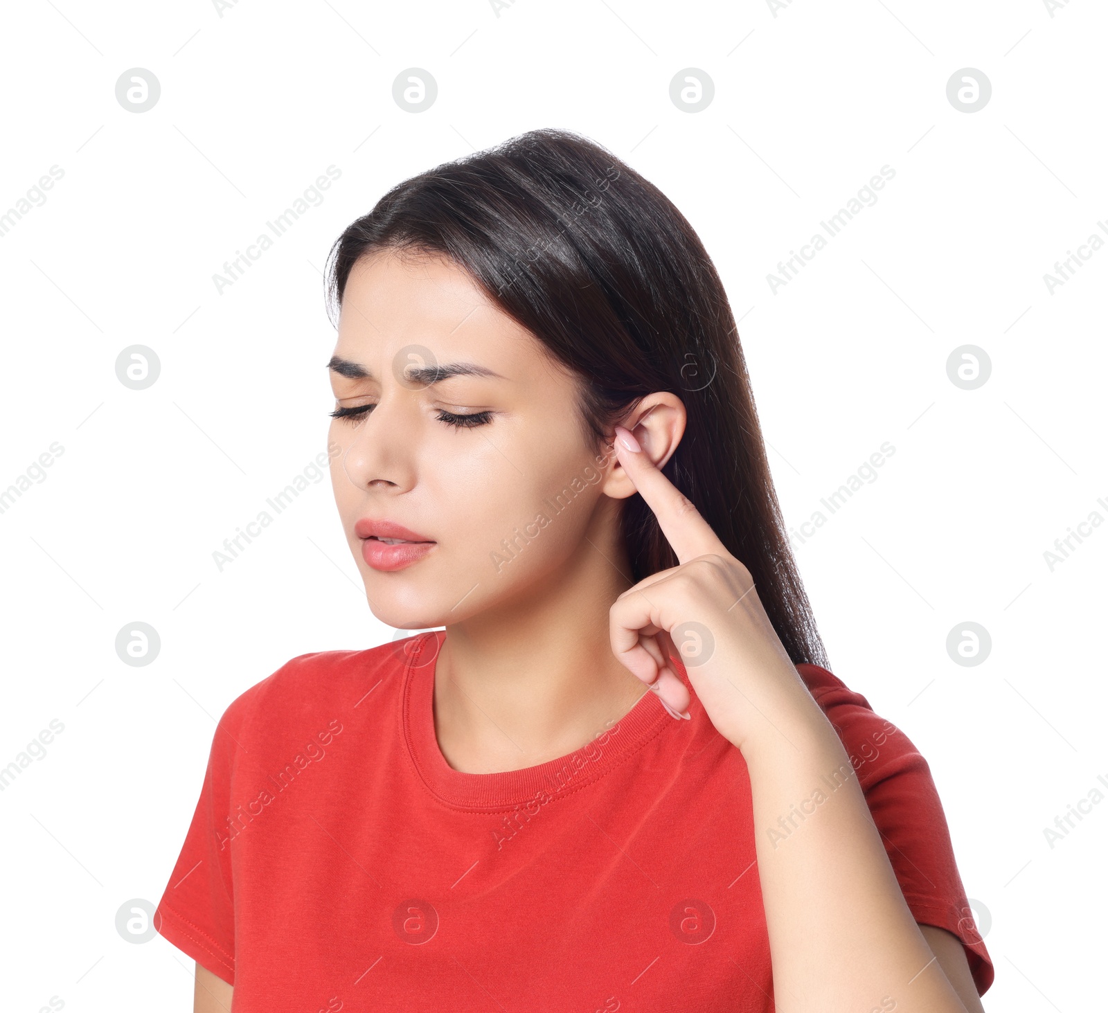 Photo of Young woman suffering from ear pain on white background