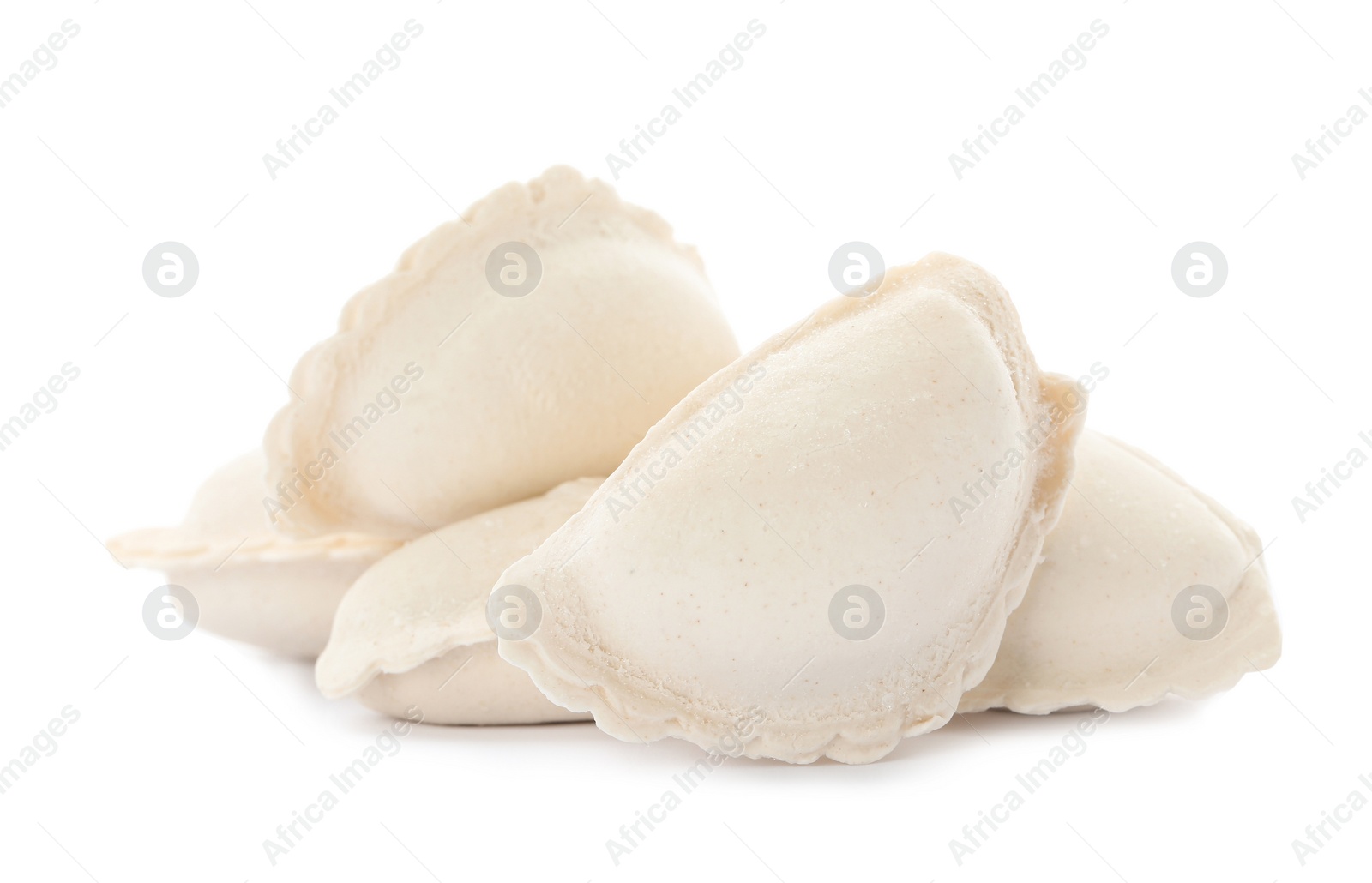 Photo of Heap of raw dumplings on white background