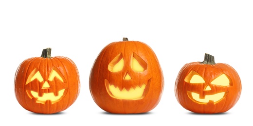 Image of Set of carved Halloween pumpkins on white background. Banner design