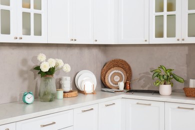 Photo of Beautiful kitchen interior with stylish modern furniture