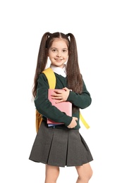 Photo of Little girl in stylish school uniform on white background