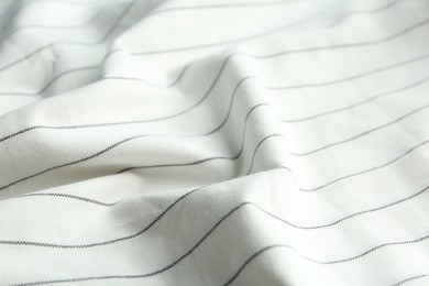 Texture of white striped fabric as background, closeup