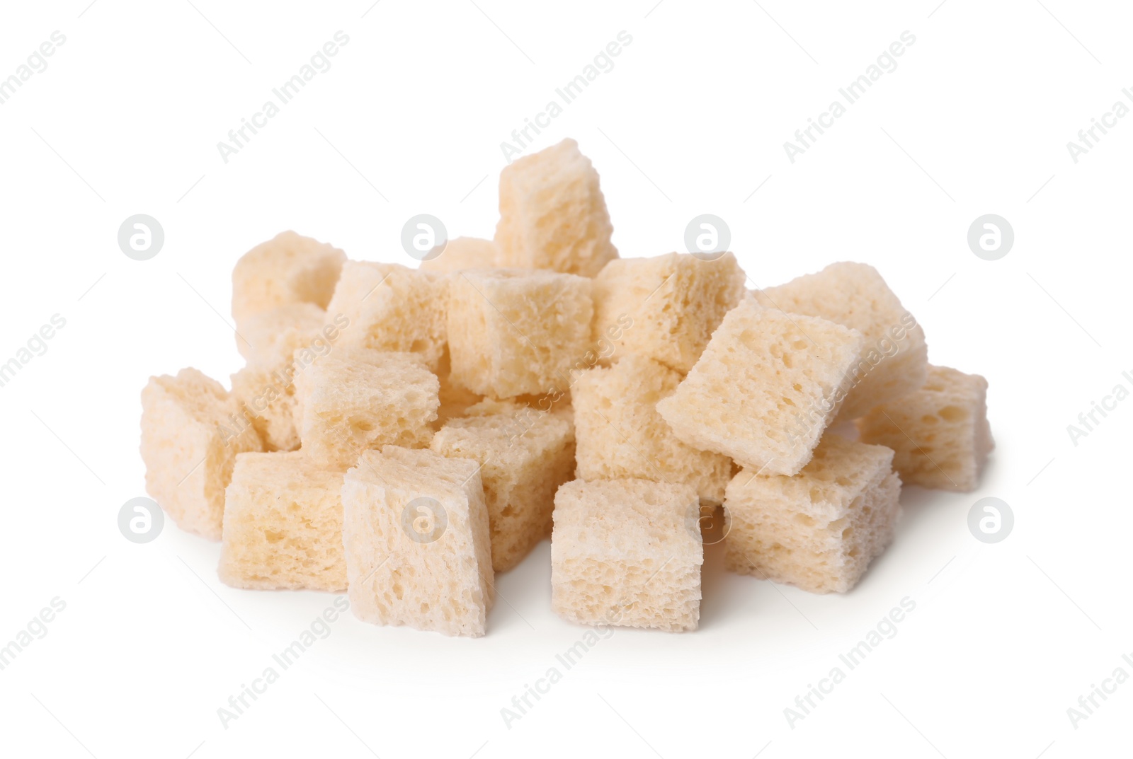 Photo of Heap of crispy croutons on white background