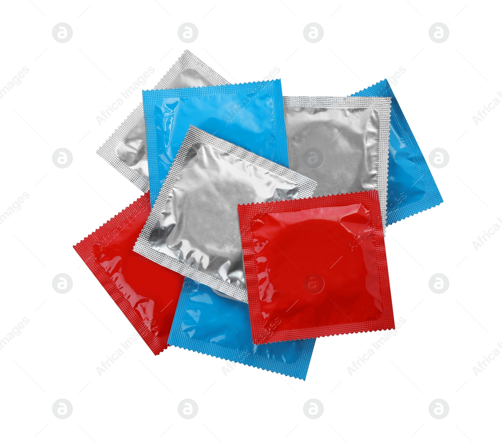 Photo of Condom packages isolated on white, top view. Safe sex