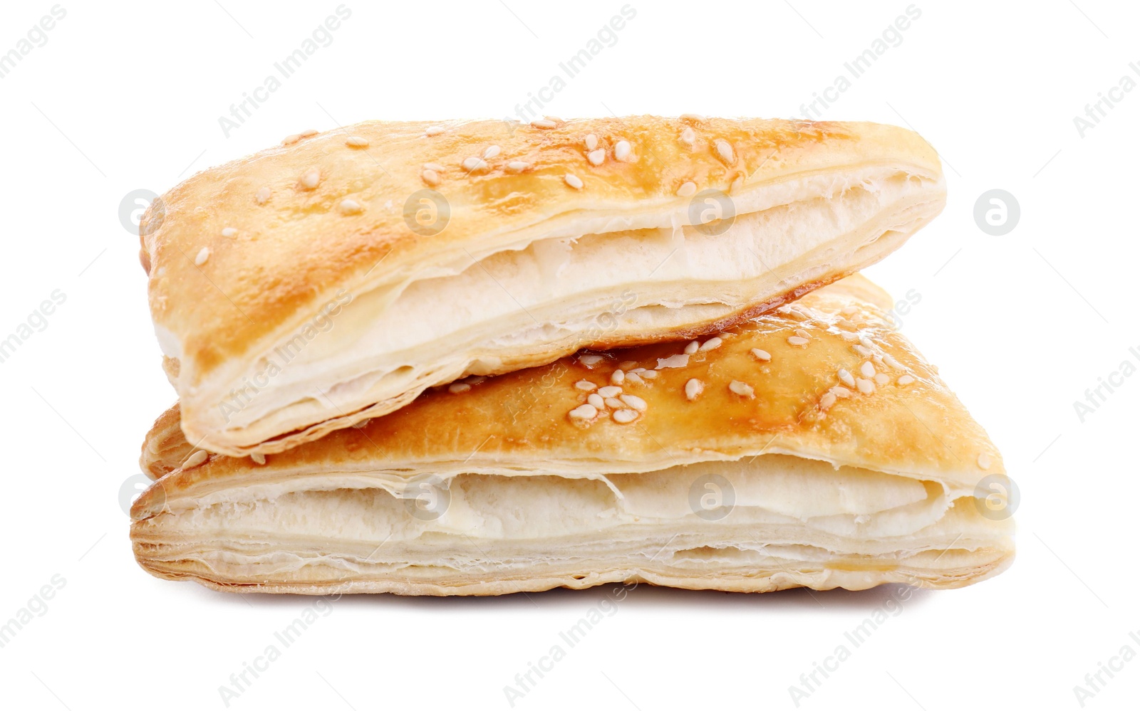 Photo of Delicious fresh puff pastries isolated on white