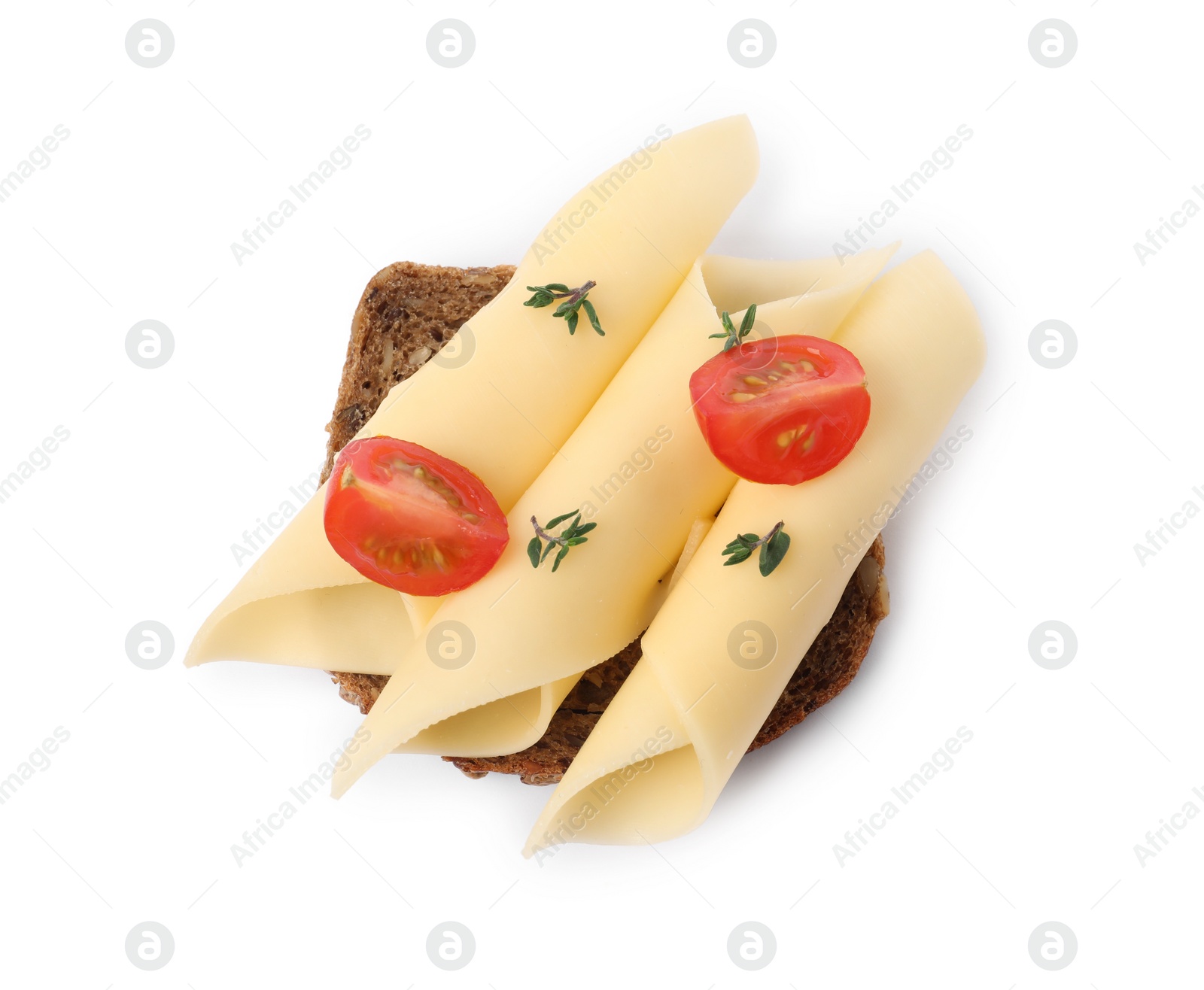 Photo of Tasty sandwich with slices of fresh cheese, tomatoes and thyme isolated on white, top view