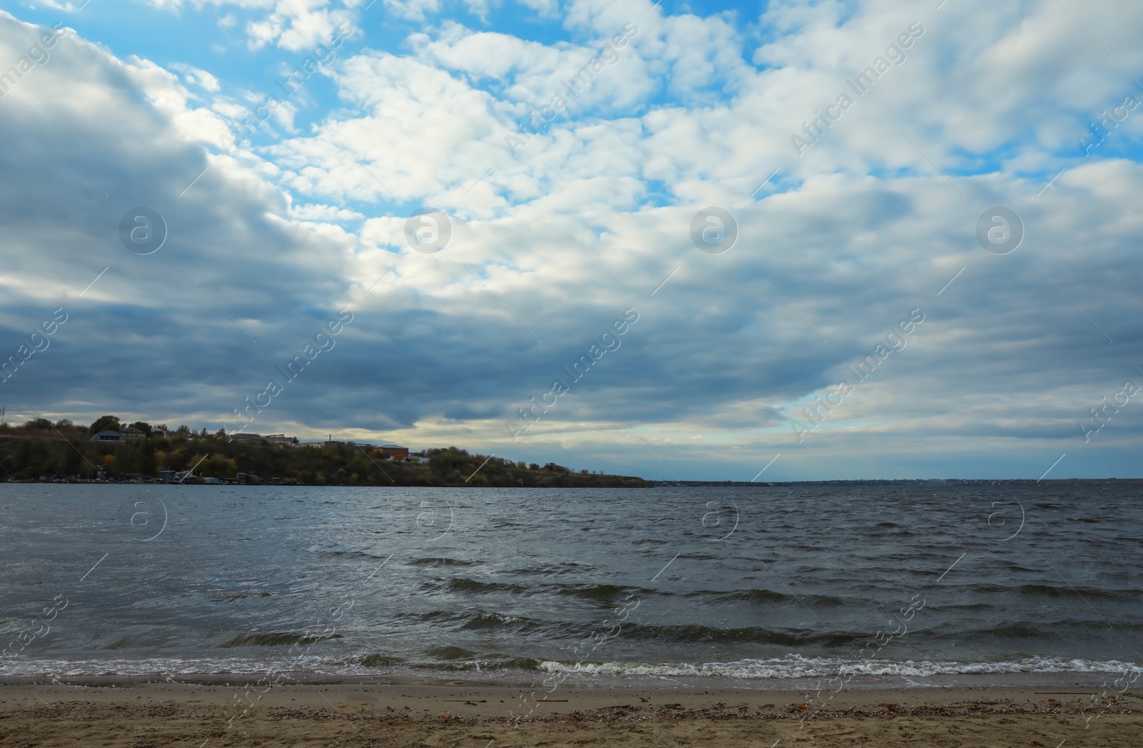 Photo of Picturesque view of riverside on cloudy day