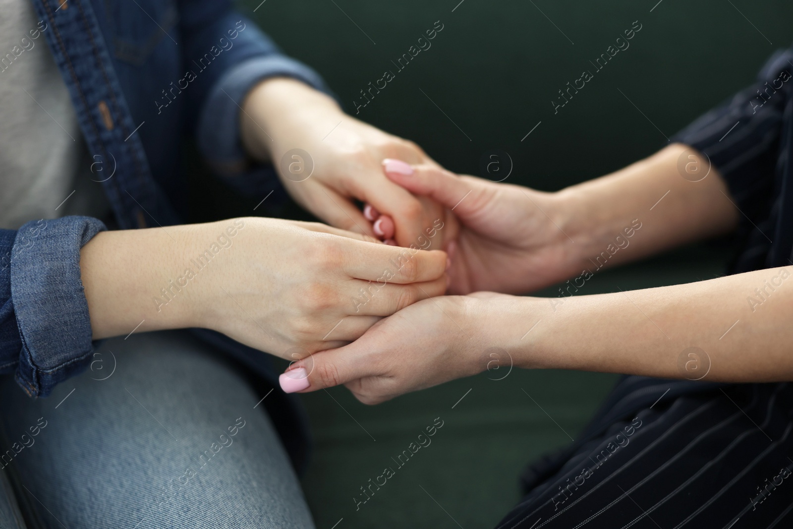 Photo of Psychotherapist working with patient in office, closeup