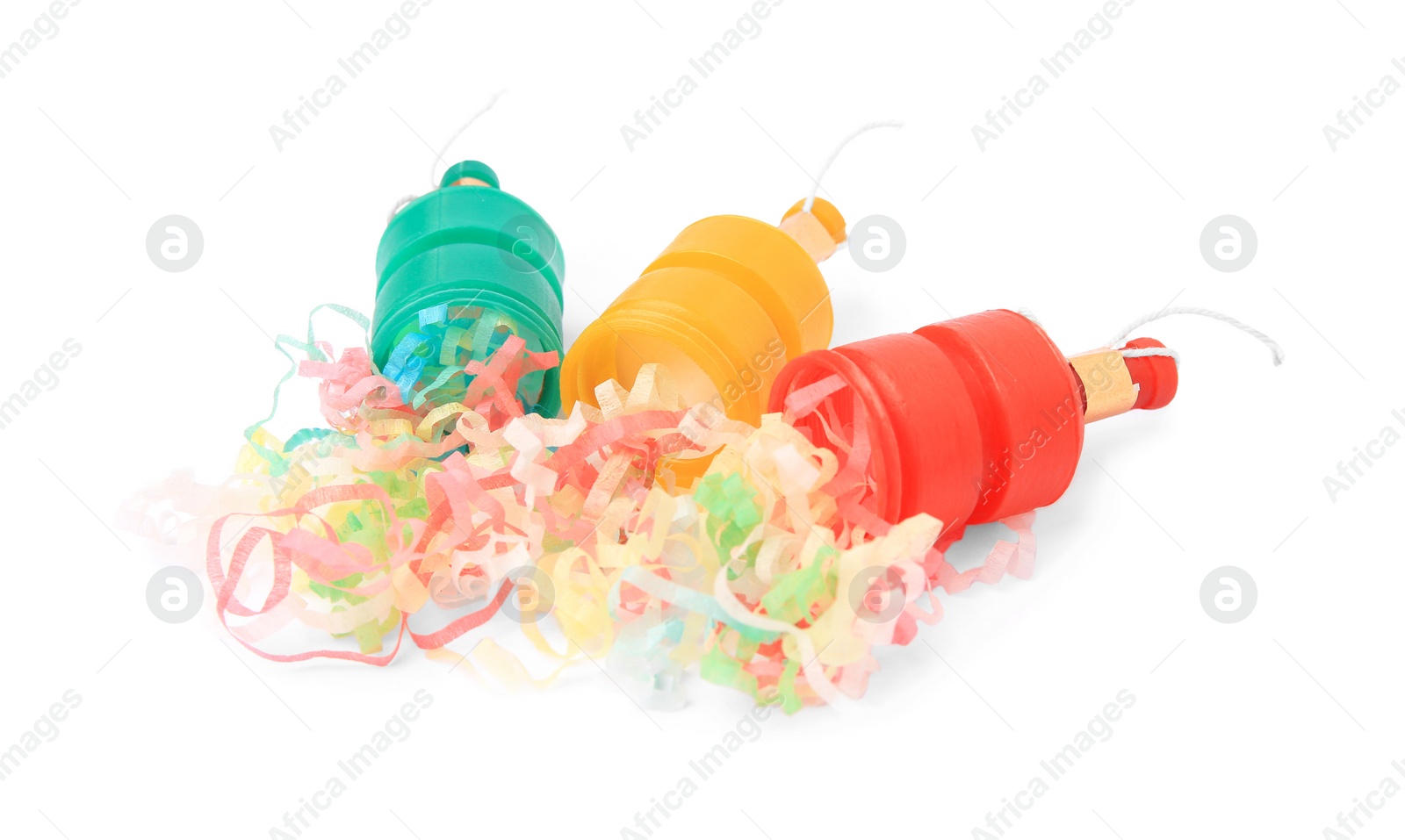 Photo of Colorful streamers with bright party crackers isolated on white