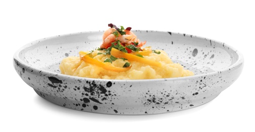 Plate with tasty shrimps and grits on white background